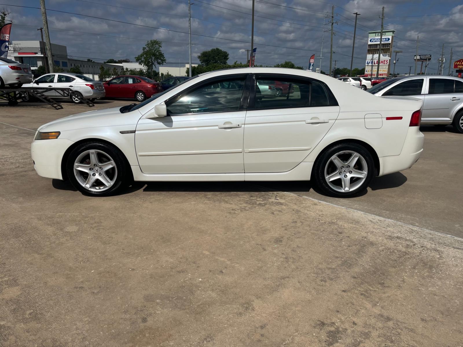2006 white /TAN Acura TL 5-Speed AT (19UUA66206A) with an 3.2L V6 SOHC 24V engine, 5-Speed Automatic Overdrive transmission, located at 14700 Tomball Parkway 249, Houston, TX, 77086, (281) 444-2200, 29.928619, -95.504074 - Photo #3